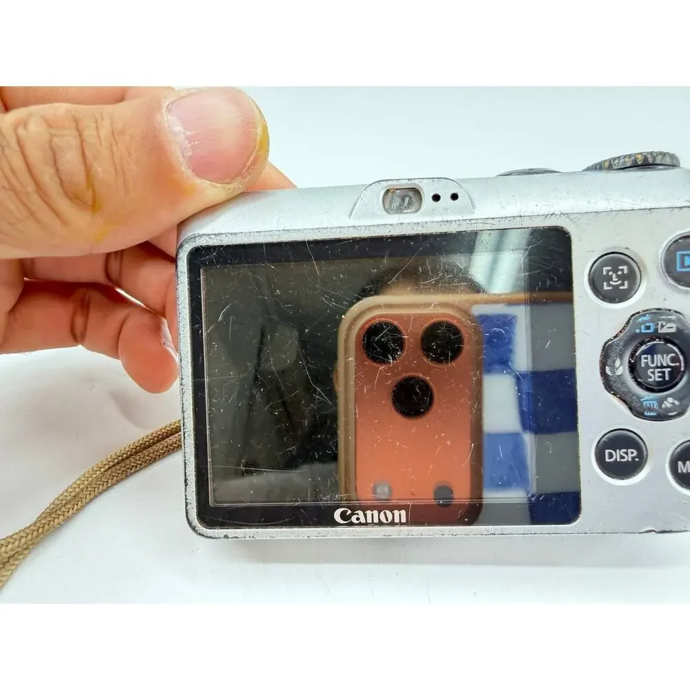 Canon PowerShot A1200 12.1MP Digital Camera Silver AS-IS Broken Battery Door